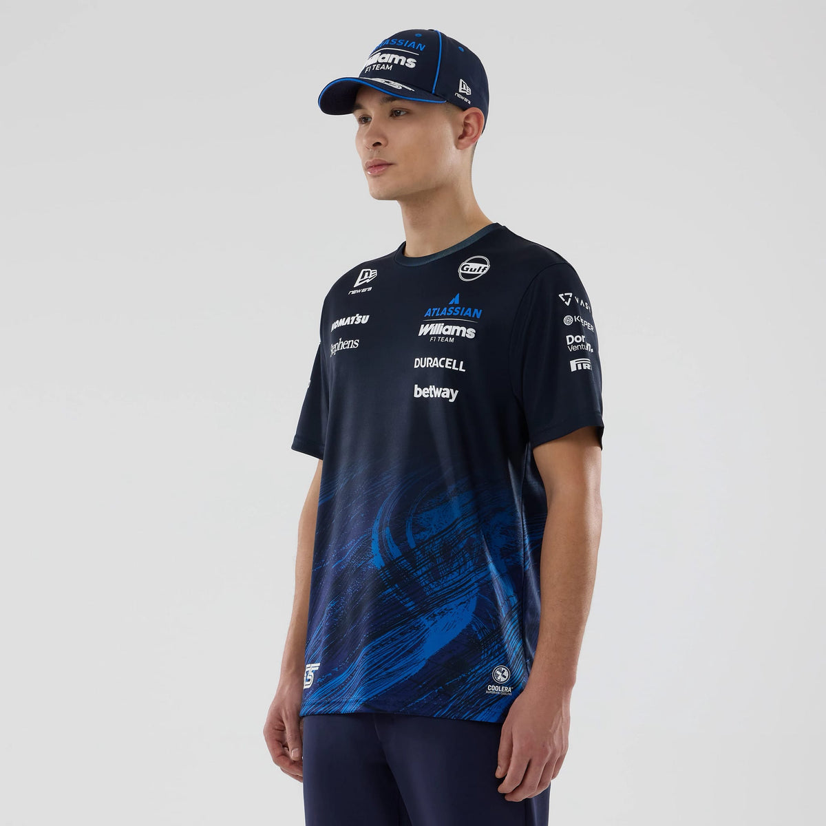 The model is wearing this Carlos Sainz Atlassian Williams F1 Team Tech T-shirt in navy. 3