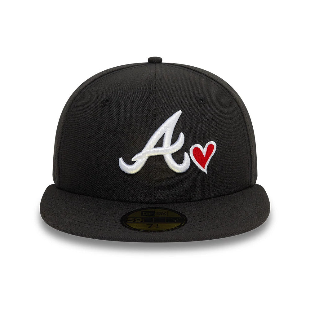 Atlanta Braves MLB Heart Icon Black New Era 59FIFTY Fitted Cap, front view showing a white embroidered A logo with a red heart icon on the front panel, paired with a flat black visor and a gold 59FIFTY size sticker.