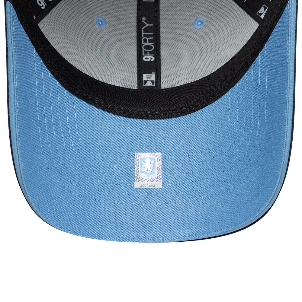 Aston Villa FC 96 Navy New Era 9FORTY Adjustable Cap, inside view showing the light blue undervisor with white stitching, a 9FORTY label on black taping running across the grey crown, and a holographic sticker at the visor's centre.
