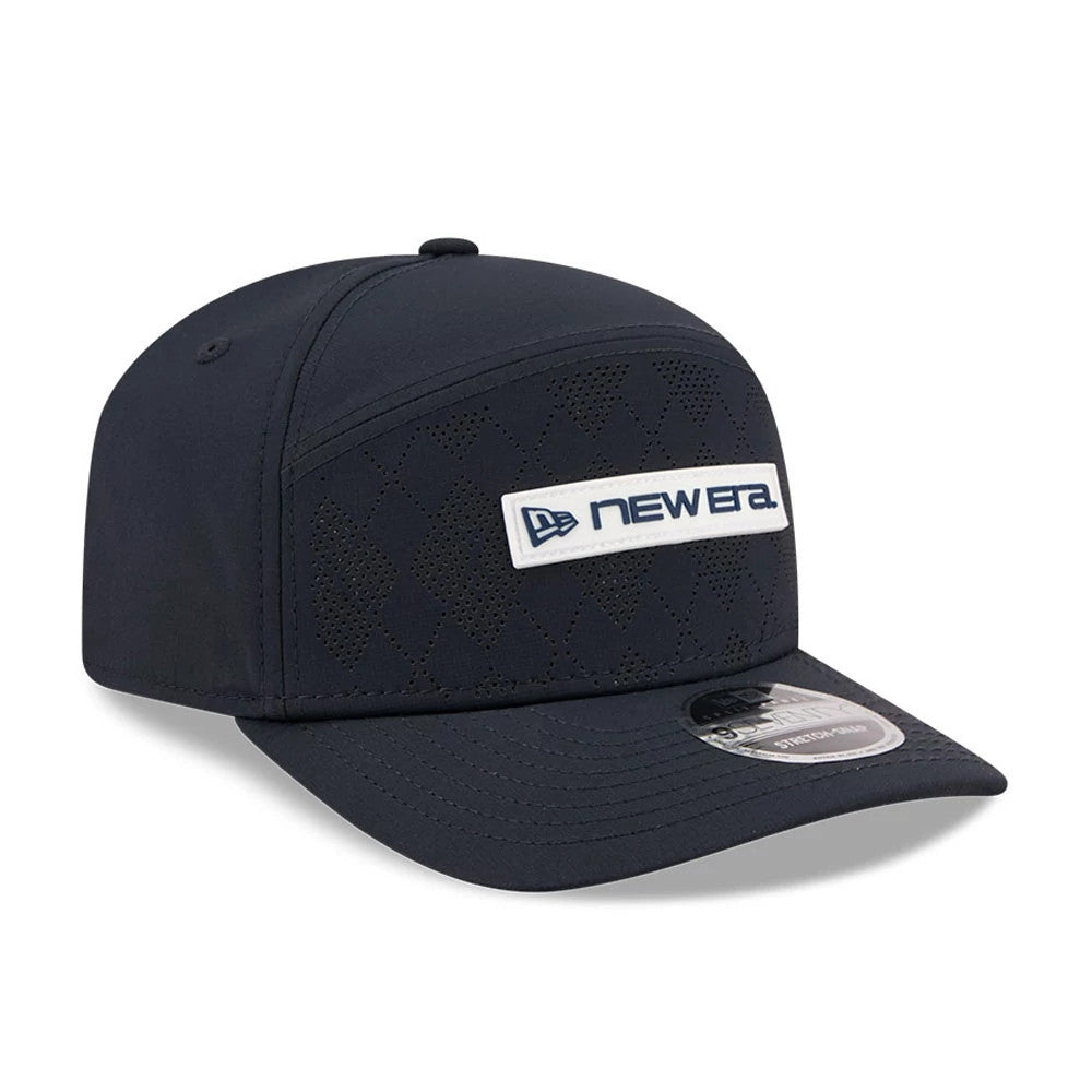 Pictured is this New Era Golf 9SEVENTY Split Panel Stretch Snap cap in navy. 4