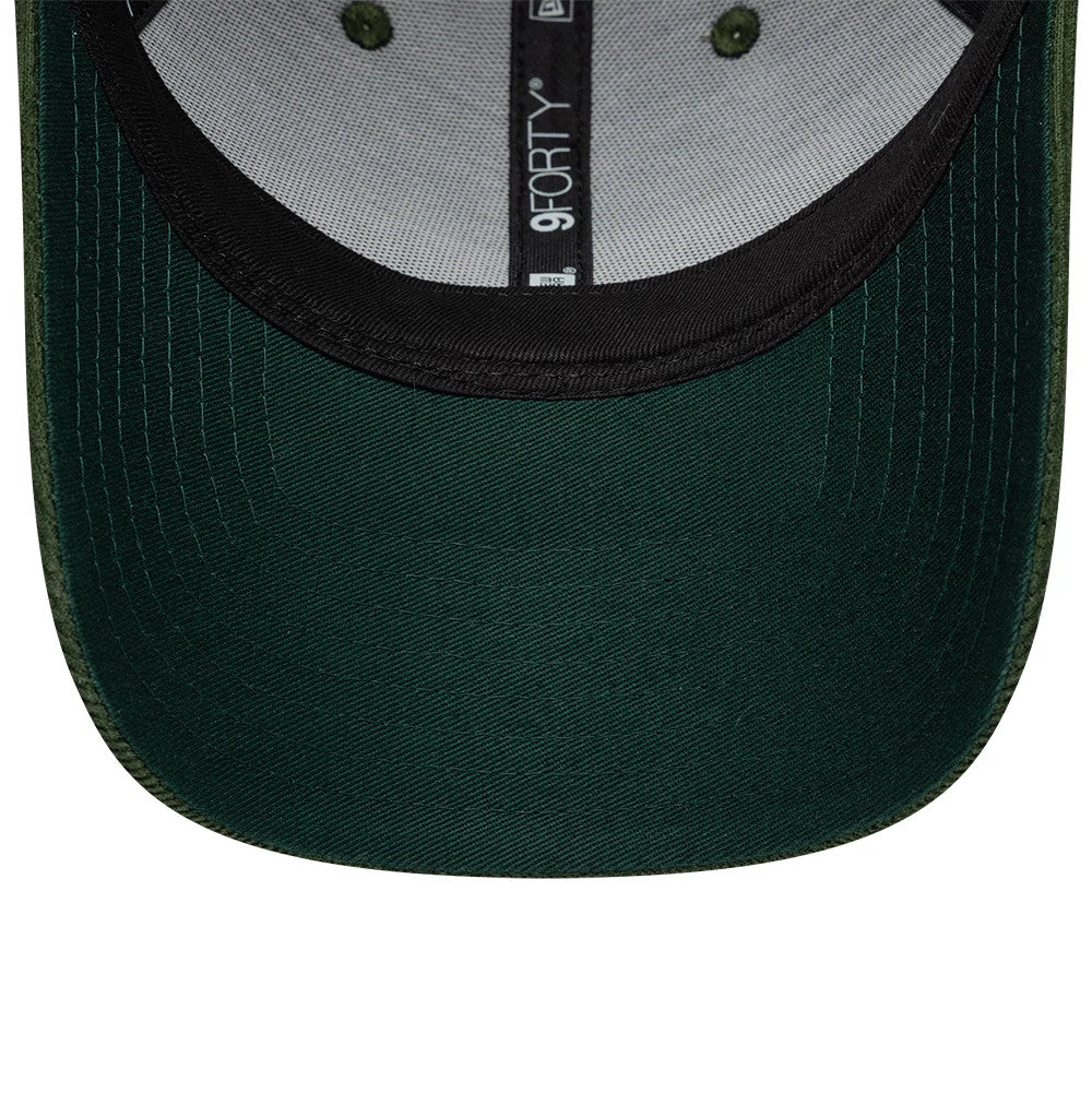 Williams Traditional Cord Dark Green New Era 9FORTY Adjustable Cap, inside view showing the dark green undervisor, black sweatband trim, and grey inner taping with a centralised 9FORTY label running along the seam.