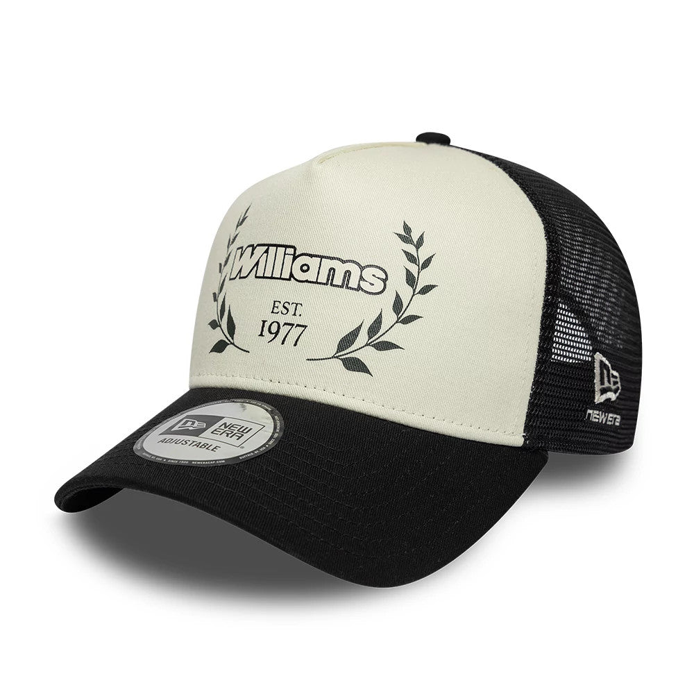 Williams Traditional Black New Era 9FORTY A-Frame Trucker Adjustable Cap, three-quarter view showing the black embroidered Williams EST. 1977 logo on the cream front panel, with a black visor, and the New Era flag logo on the black mesh side.