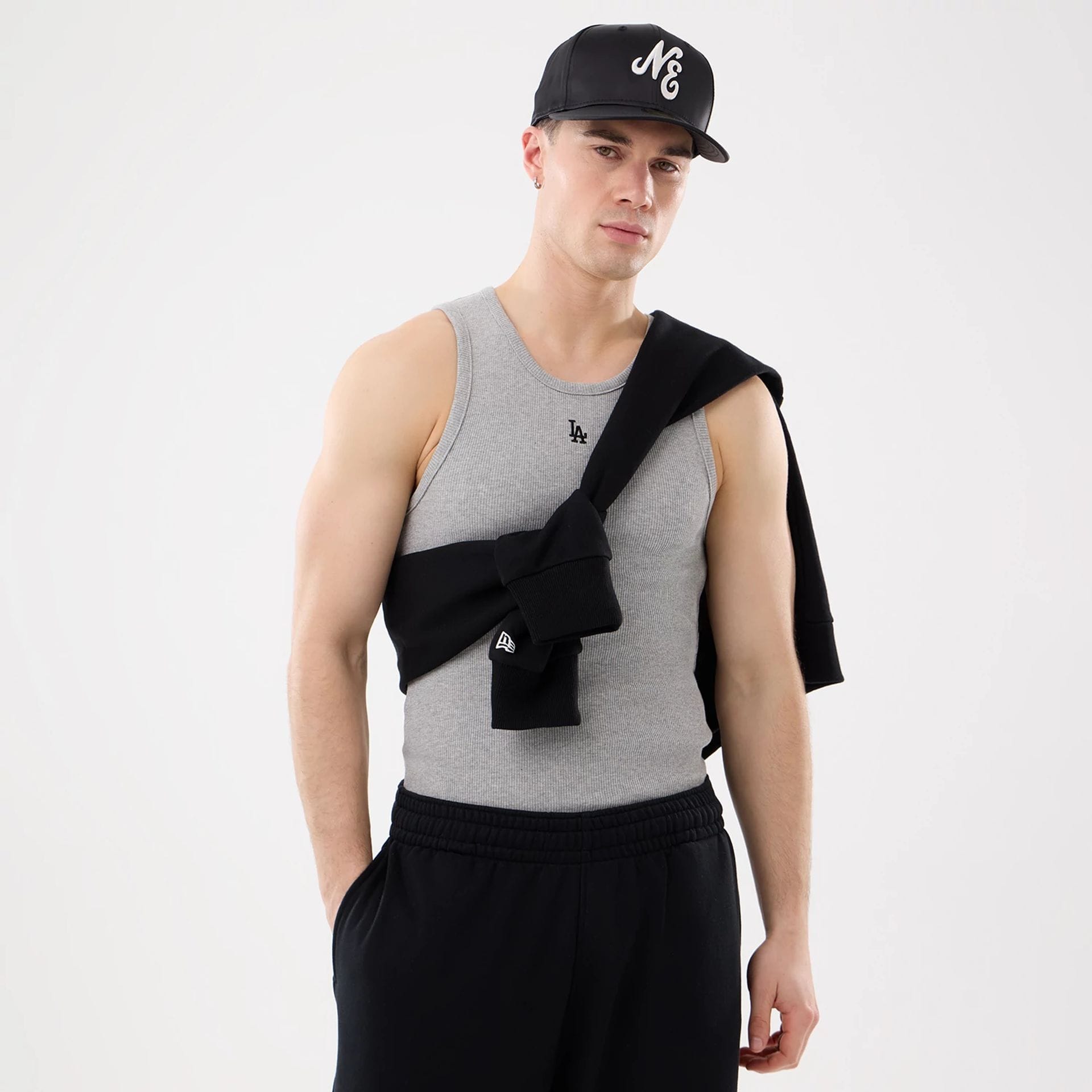 The model is wearing this MLB Rib LA Dodgers Vest in grey. 1