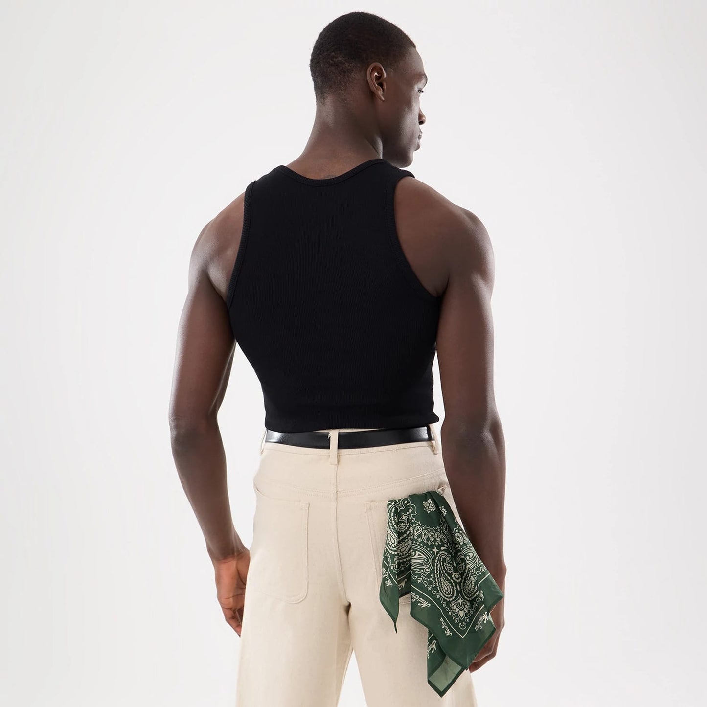 The model is wearing this New Era Rib Vest in black. 18