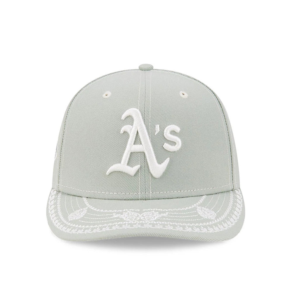 Athletics MLB Pastel Green New Era 59FIFTY Fitted Cap, front view showing the white raised embroidered Athletics A's logo on the structured pastel green crown, with intricate white embroidery on the flat visor.