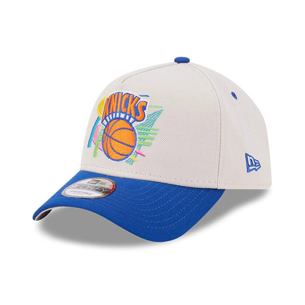 Pictured is this NBA Hardwood Classic New York Knicks 9FORTY A-Frame Adjustable cap in light beige & blue. 4