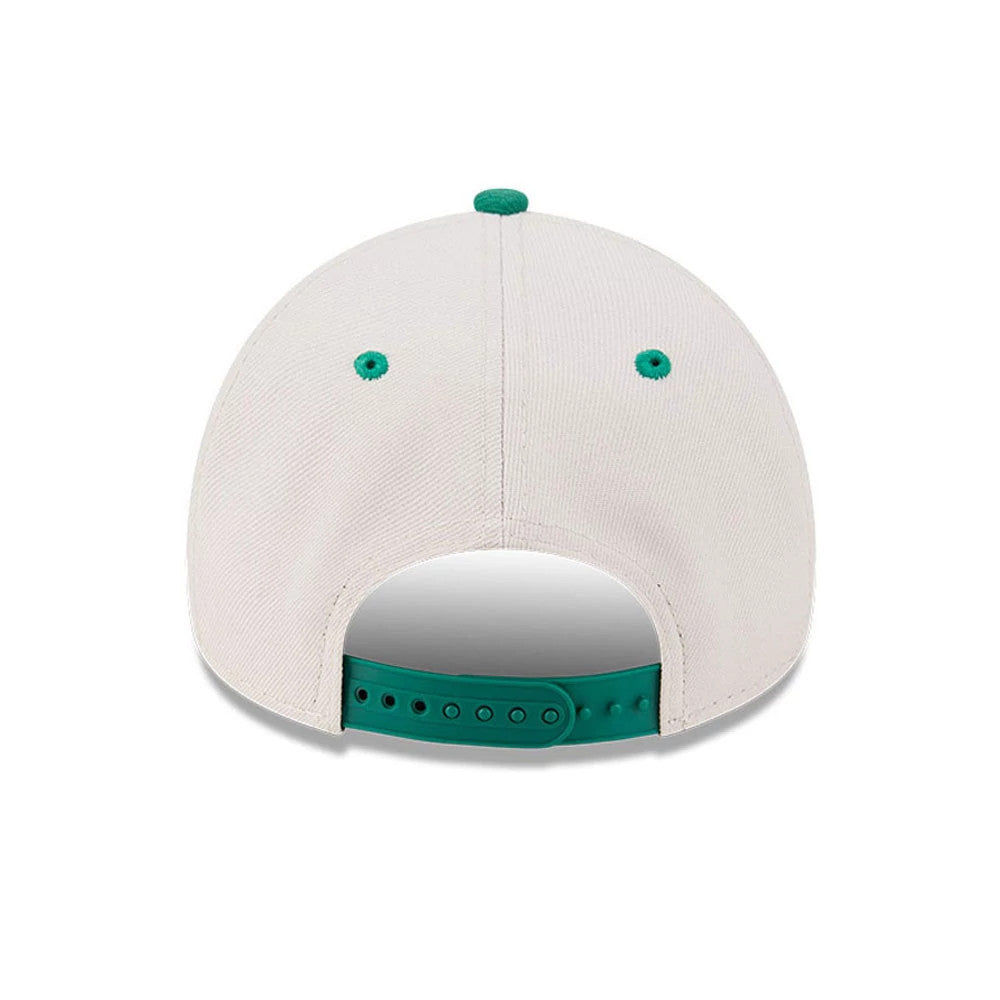 Boston Celtics NBA Hardwood Classic Light Beige New Era 9FORTY A-Frame Adjustable Cap, rear view showing the green top button and eyelets on the light beige panels, with a green adjustable strap and no logo on the back.