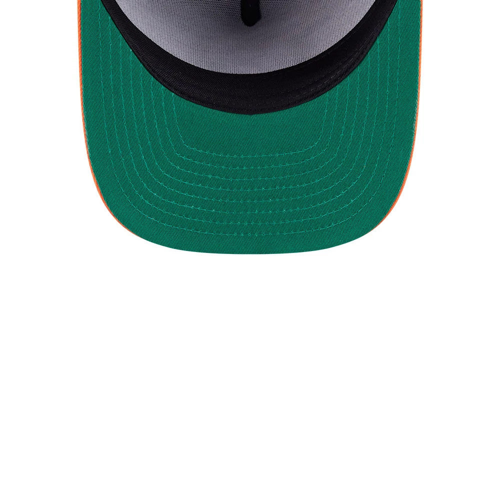 Bugs Bunny Looney Tunes Chasin Carrots Black New Era 59FIFTY A-Frame Fitted Cap, inside view showing the green undervisor, a white interior lining on the structured crown, and a contrasting orange edge along the visor.