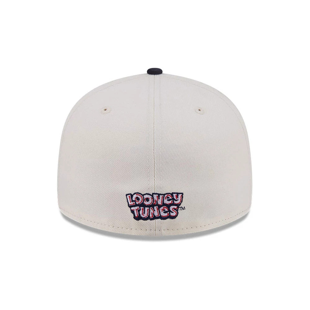 Multi Character Looney Tunes Pwetty Cat Beige & Navy New Era 59FIFTY Fitted Cap, rear view showing the colourful Looney Tunes logo embroidered in the centre of the beige back panels, with a black top button and matching eyelets.
