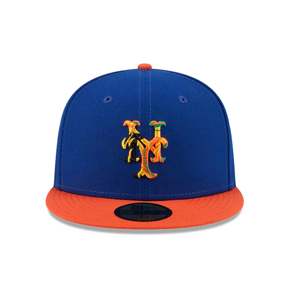 New York Mets MLB X Coming To America Blue New Era 59FIFTY Fitted Cap, front view showing multicolour NY logo in raised embroidery at the centre of the structured blue crown, with a contrasting orange flat visor and 59FIFTY size sticker.