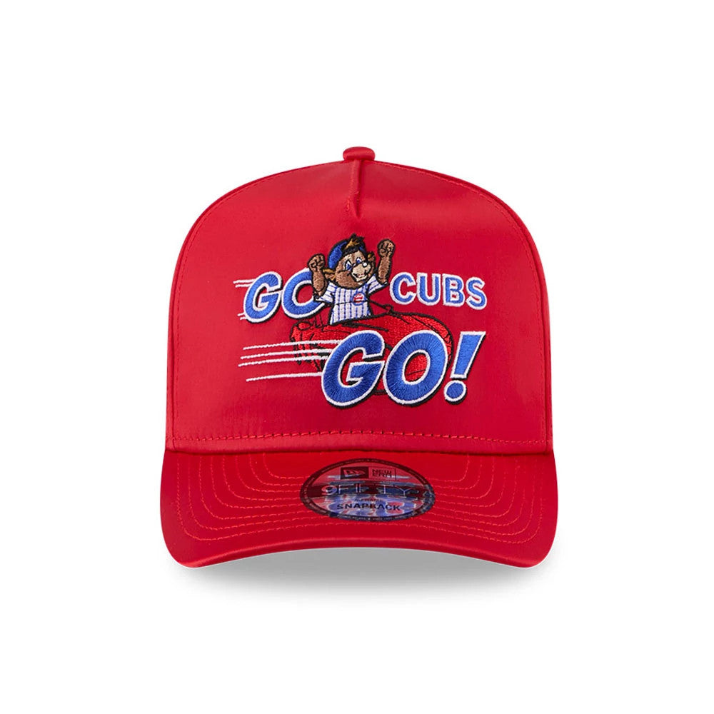 Cubs MLB X Ferris Bueller's Day Off Red New Era 9FIFTY A-Frame Snapback Adjustable Cap, front view showing the Go Cubs Go! graphic with a bear driving a red car, blue and white embroidery, and a 9FIFTY size sticker on the curved red visor.