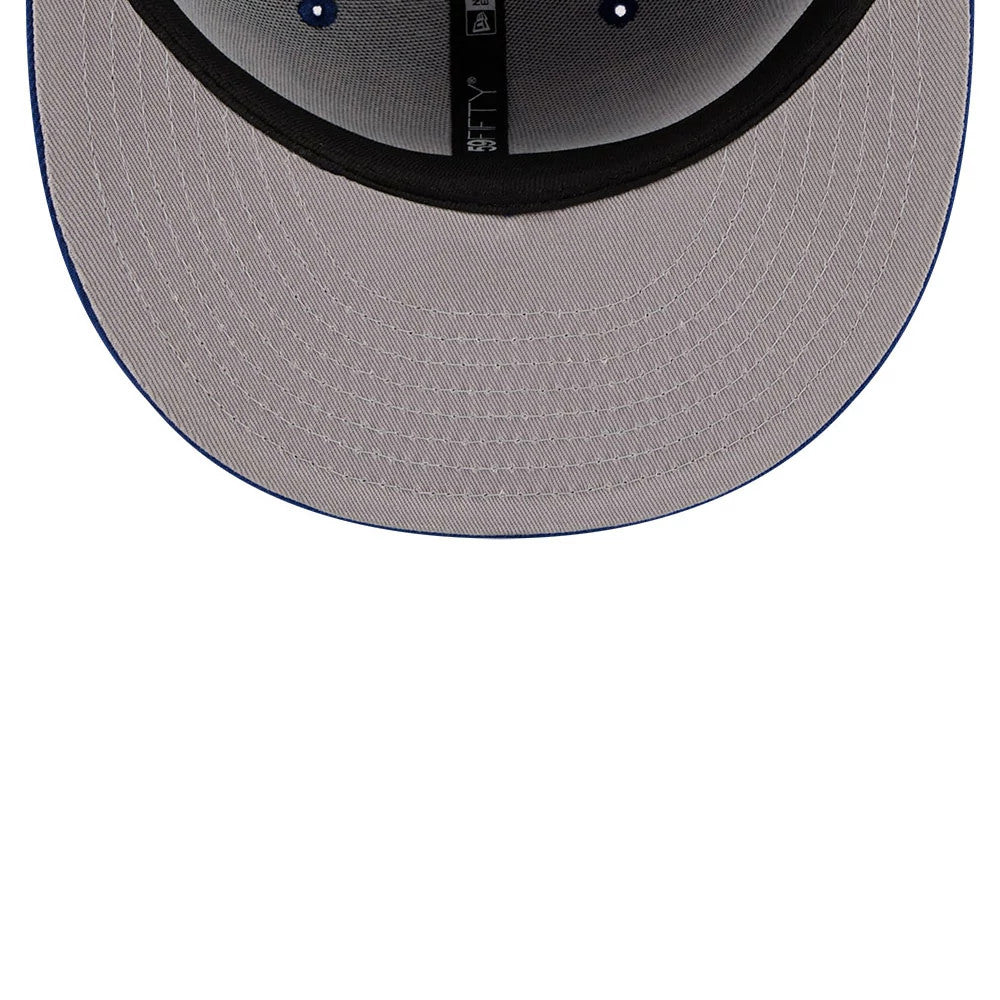 New York Mets MLB X Seinfeld Cooperstown Blue New Era 59FIFTY Fitted Cap, inside view showing a grey undervisor, black sweatband, and black taping with white New Era 59FIFTY branding, complemented by blue stitching details on the eyelets.