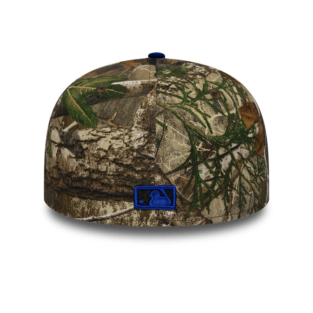 Toronto Blue Jays MLB Realtree Assorted Print Low Profile New Era 59FIFTY Fitted Cap, rear view showing an eye-catching blue embroidered MLB Batterman logo centred on the back panels, featuring a detailed camo print with foliage and branches.