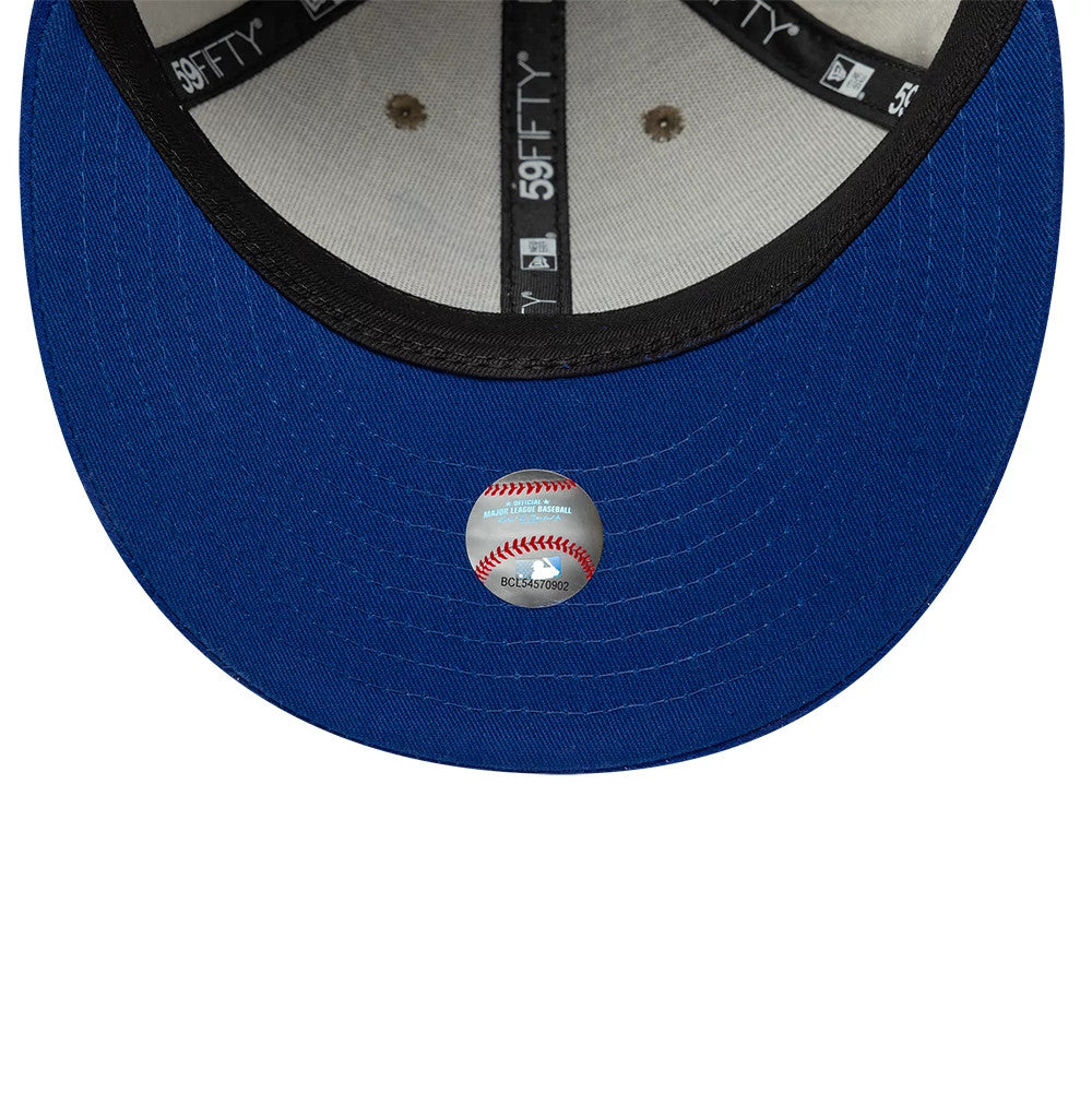 Toronto Blue Jays MLB Realtree Assorted Print Low Profile New Era 59FIFTY Fitted Cap, inside view showing black taping with white 59FIFTY branding, a grey sweatband, and a baseball graphic sticker on a royal blue undervisor.