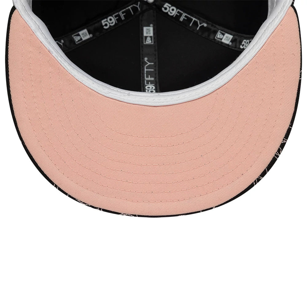 New Era Cherry Blossom Black 59FIFTY Fitted Cap, inside view showing the pink undervisor, black sweatband featuring repeated 59FIFTY branding, and black inner taping adorned with a series of small white logos along the seams.