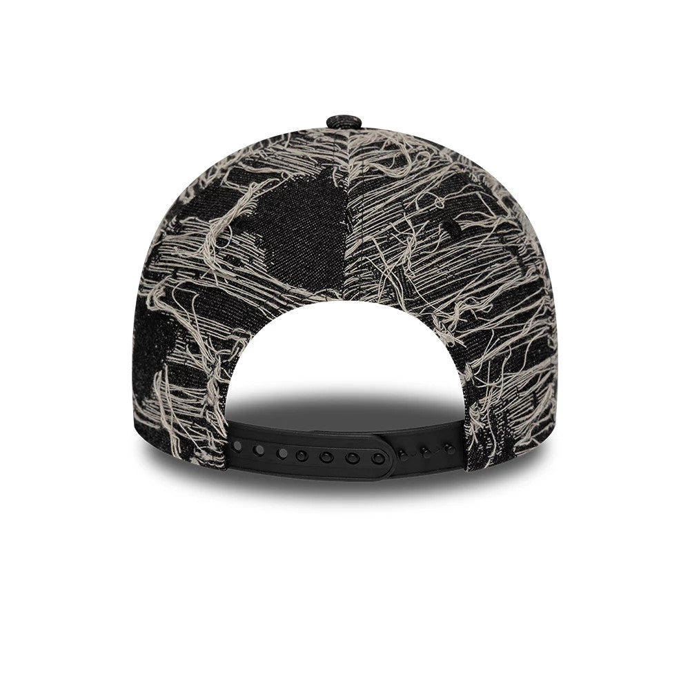 New York Yankees MLB Distressed Denim Black New Era 9FORTY E-Frame Adjustable Cap, rear view showing the distressed denim fabric with frayed across the black panels and a black adjustable strap for a custom fit.