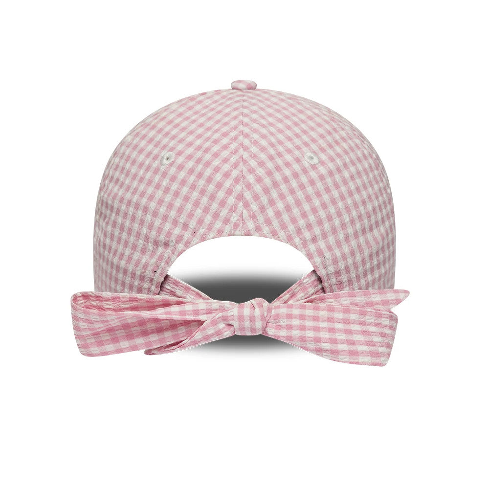Pictured is this New Era Gingham Bowback 9TWENTY Adjustable cap in pastel pink. 2