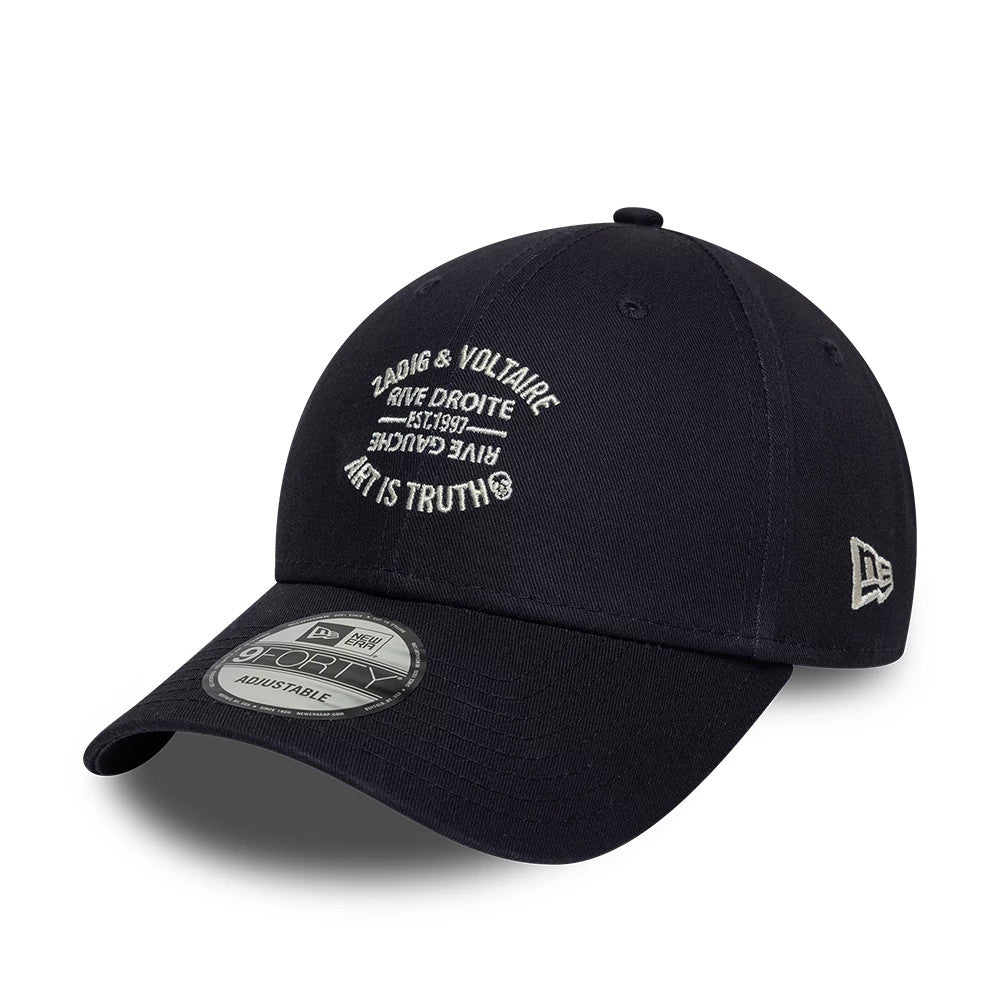New Era X Zadig & Voltaire Resort Navy 9FORTY Adjustable Cap, front view showing the white embroidered text and graphics on the structured navy crown, complemented by a curved visor with a 9FORTY size sticker and a New Era flag logo on the left side.