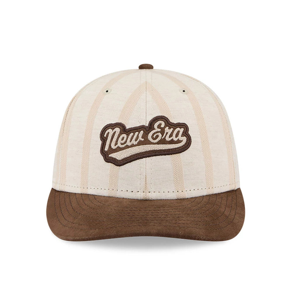 New Era 59FIFTY Day Open Beige Low Profile 59FIFTY Fitted Cap, front view showing the raised brown embroidered New Era script logo on the centre of the beige crown with light brown pinstripes, and a brown flat visor.