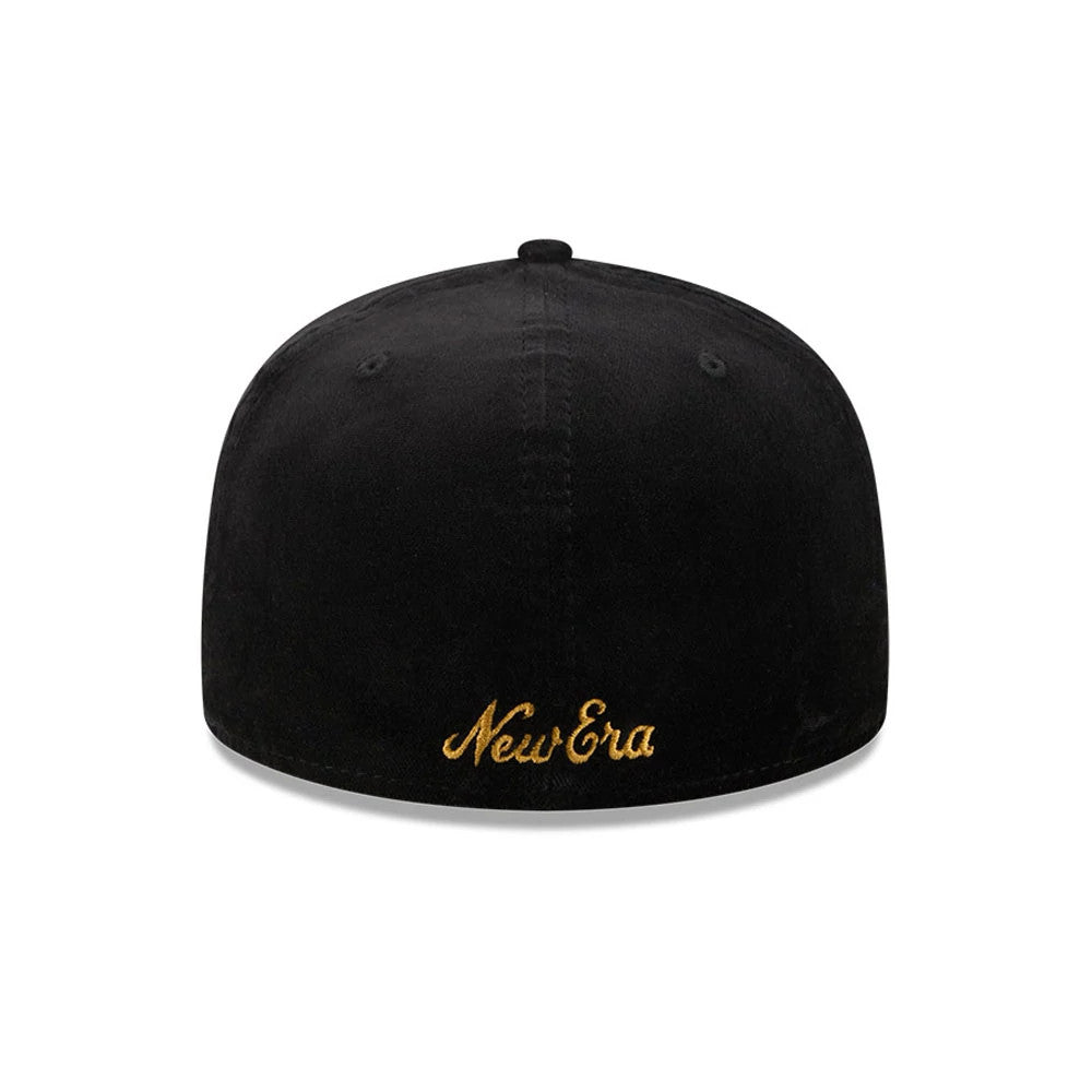 New Era 59FIFTY Day Sidepatch Black 59FIFTY Fitted Cap, rear view showing the gold embroidered New Era script logo at the base of the black structured crown, with matching black eyelets and top button for a sleek, cohesive finish.