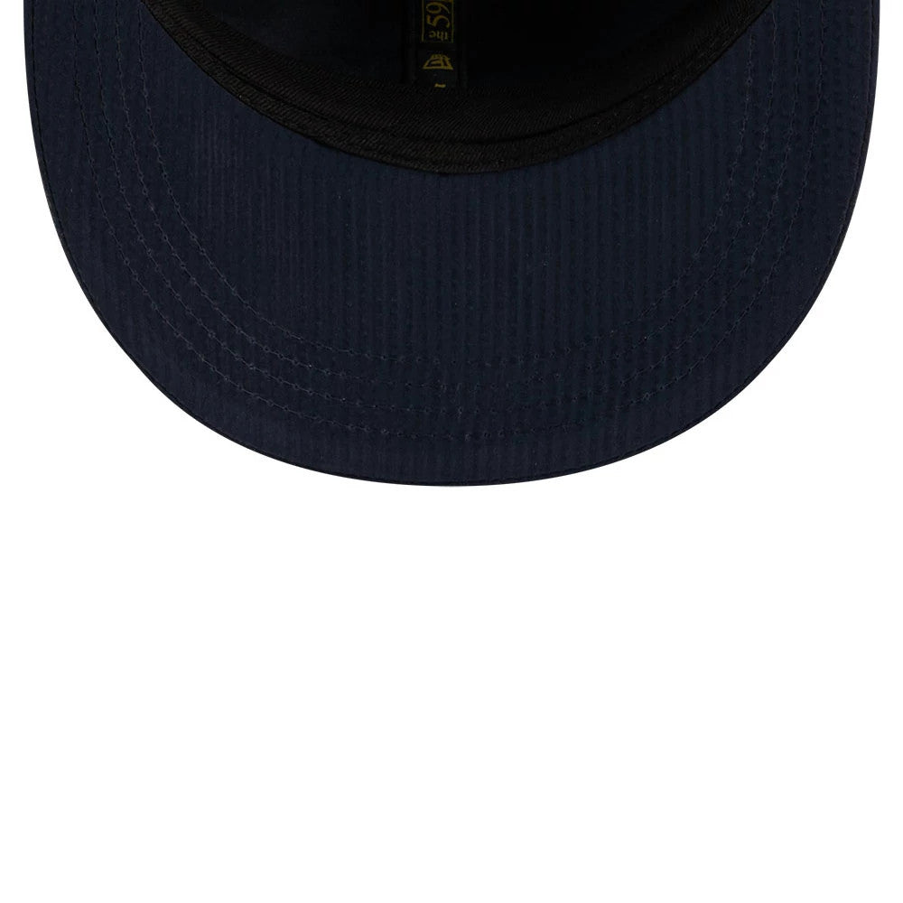 Pictured is this New Era 59FIFTY Day Seersucker Retro Crown 59FIFTY Fitted cap in navy. 7