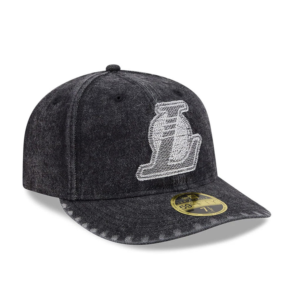 LA Lakers NBA 59FIFTY Day Black Low Profile New Era 59FIFTY Fitted Cap, three-quarter view showing the large white embroidered L logo on the front panel, with a flat black visor and a gold 59FIFTY size sticker on the visor.