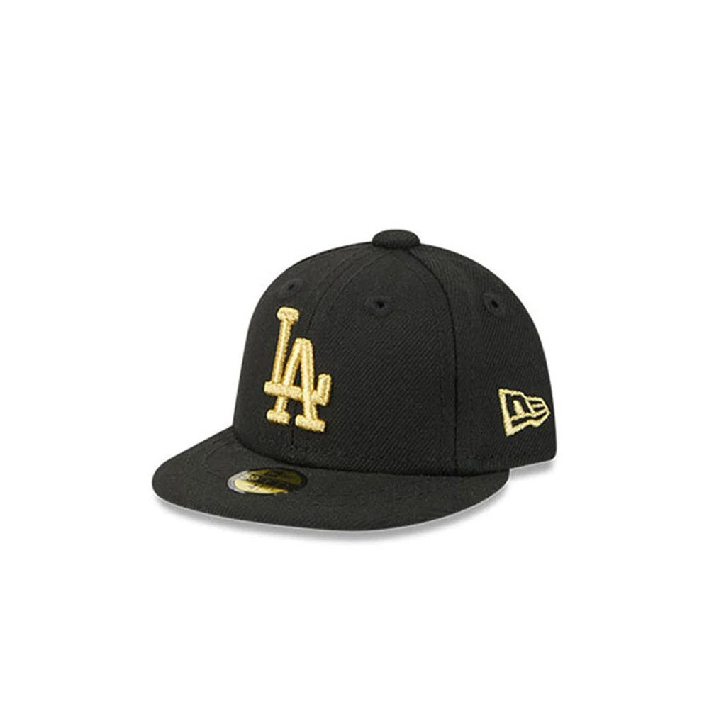 LA Dodgers MLB 59FIFTY Day Black New Era 59FIFTY Fitted Cap, three-quarter view showing the raised gold embroidered LA logo on the front panel, matching New Era flag logo on the left side, and a gold 59FIFTY size sticker on the black visor.