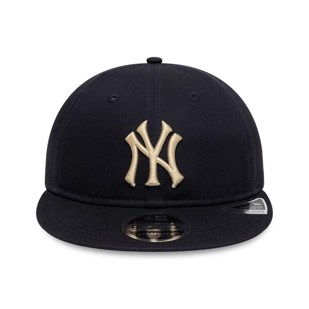 New York Yankees MLB Navy Retro Crown New Era 9FIFTY Adjustable Cap, front view showing the gold embroidered NY logo on the navy crown, flat navy visor with a 9FIFTY size sticker, and matching top button.