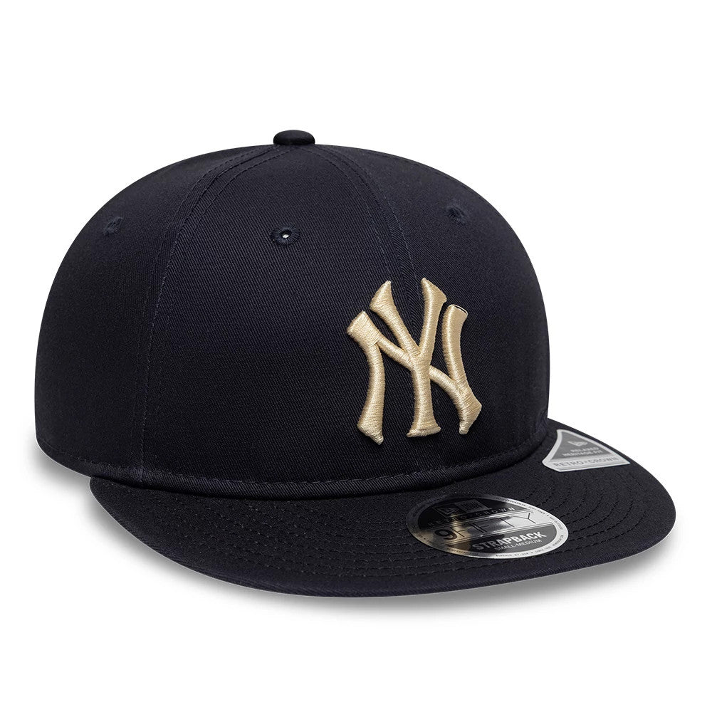 New York Yankees MLB Navy Retro Crown New Era 9FIFTY Adjustable Cap, three-quarter view showing a raised gold embroidered Yankees logo on the front panel, with a navy flat visor and a 9FIFTY size sticker on the top.