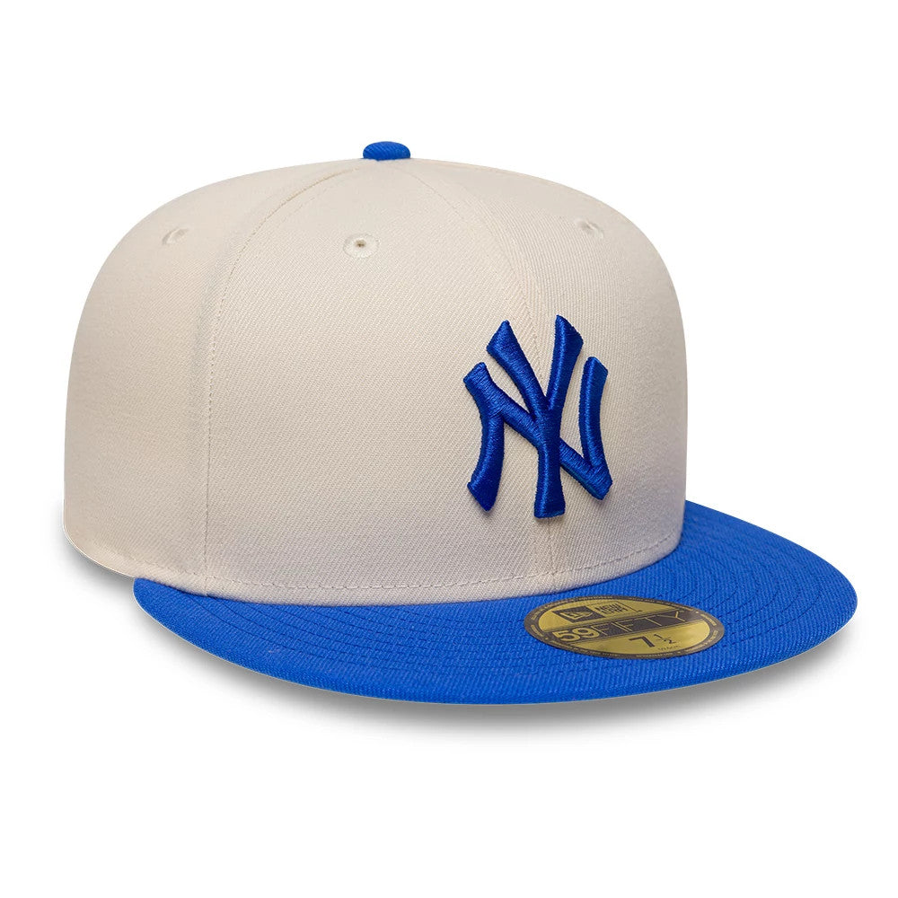 Pictured is this MLB League Essential New York Yankees 59FIFTY Fitted cap in blue. 3