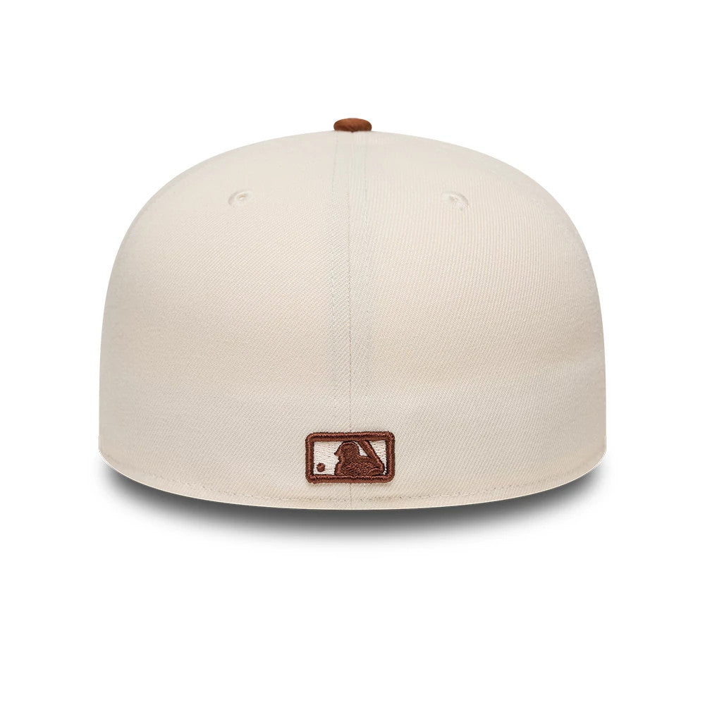 Pictured is this MLB League Essential New York Yankees 59FIFTY Fitted cap in cream. 4