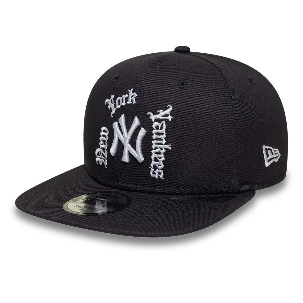 New York Yankees MLB Navy New Era 9FIFTY Snapback Adjustable Cap, three-quarter view showing raised white embroidered Yankees logo on front panel with gothic script, black flat visor featuring a silver 9FIFTY size sticker.
