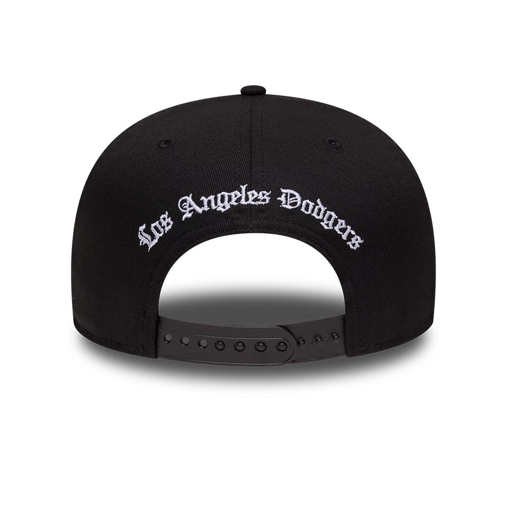 LA Dodgers MLB Black New Era 9FIFTY Snapback Adjustable Cap, rear view showing the Los Angeles Dodgers white embroidered script logo across the back above the black adjustable snap closure on the structured black crown.