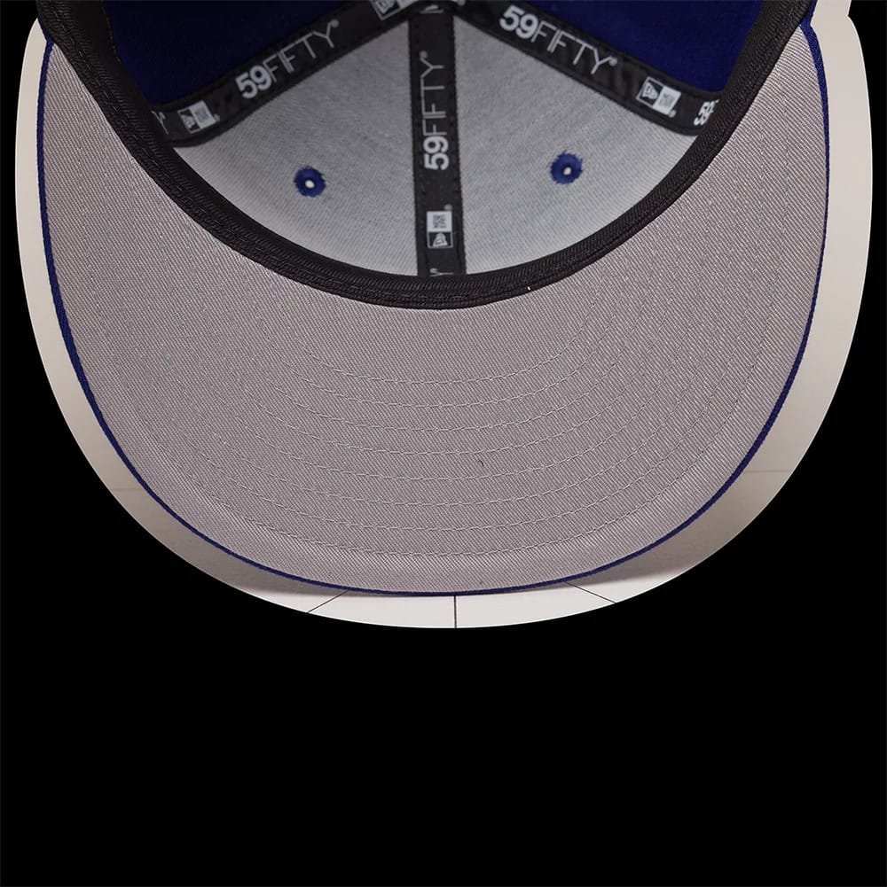 Pictured is this MLB Emblem LA Dodgers 59FIFTY Fitted cap in dark blue. 2