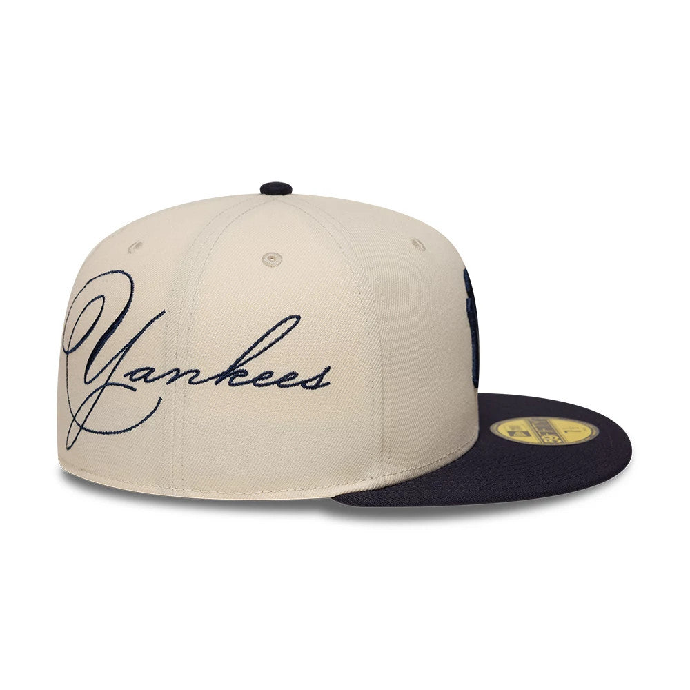 Pictured is this MLB Side Script New York Yankees 59FIFTY Fitted cap in cream & navy. 3