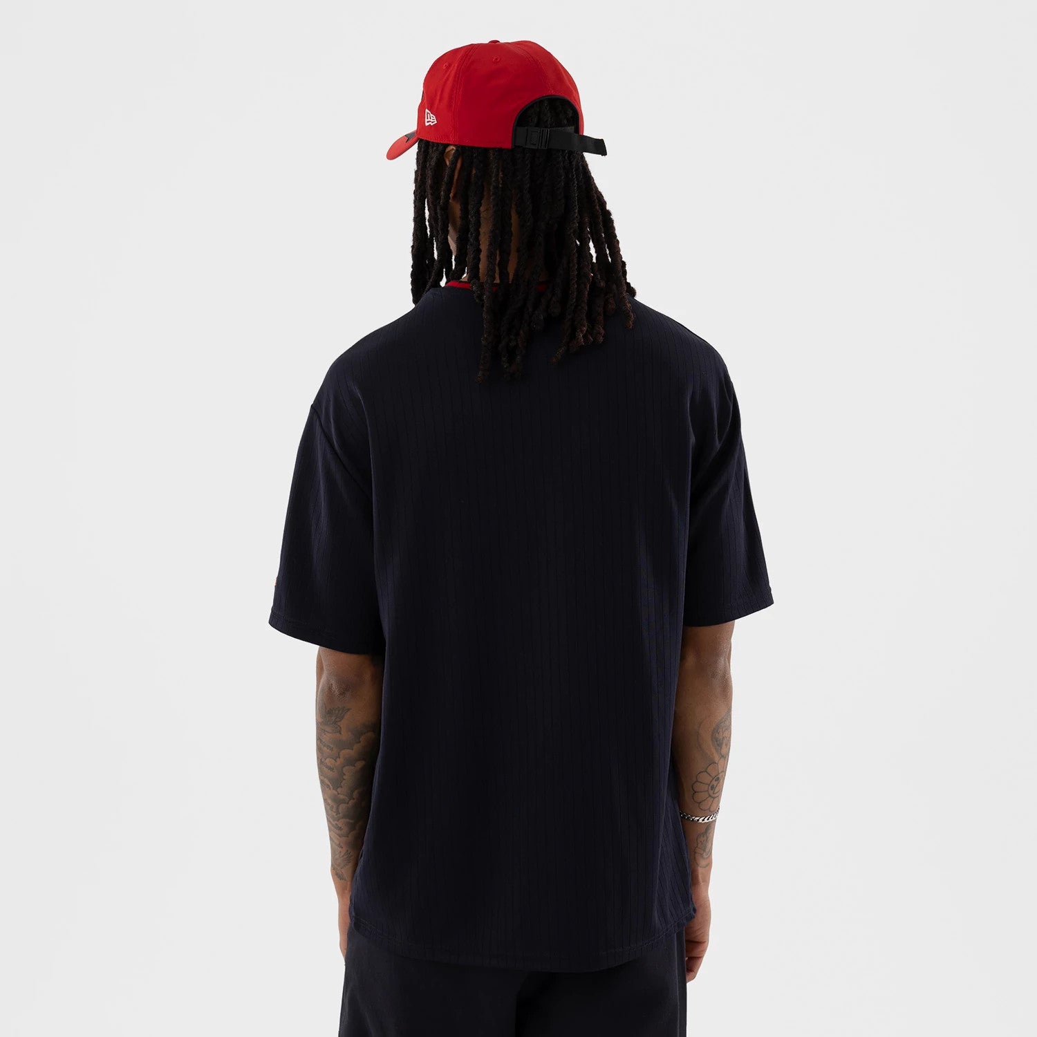 The model is wearing this LMB Sultanes De Monterrey Oversized T-Shirt in navy. 2
