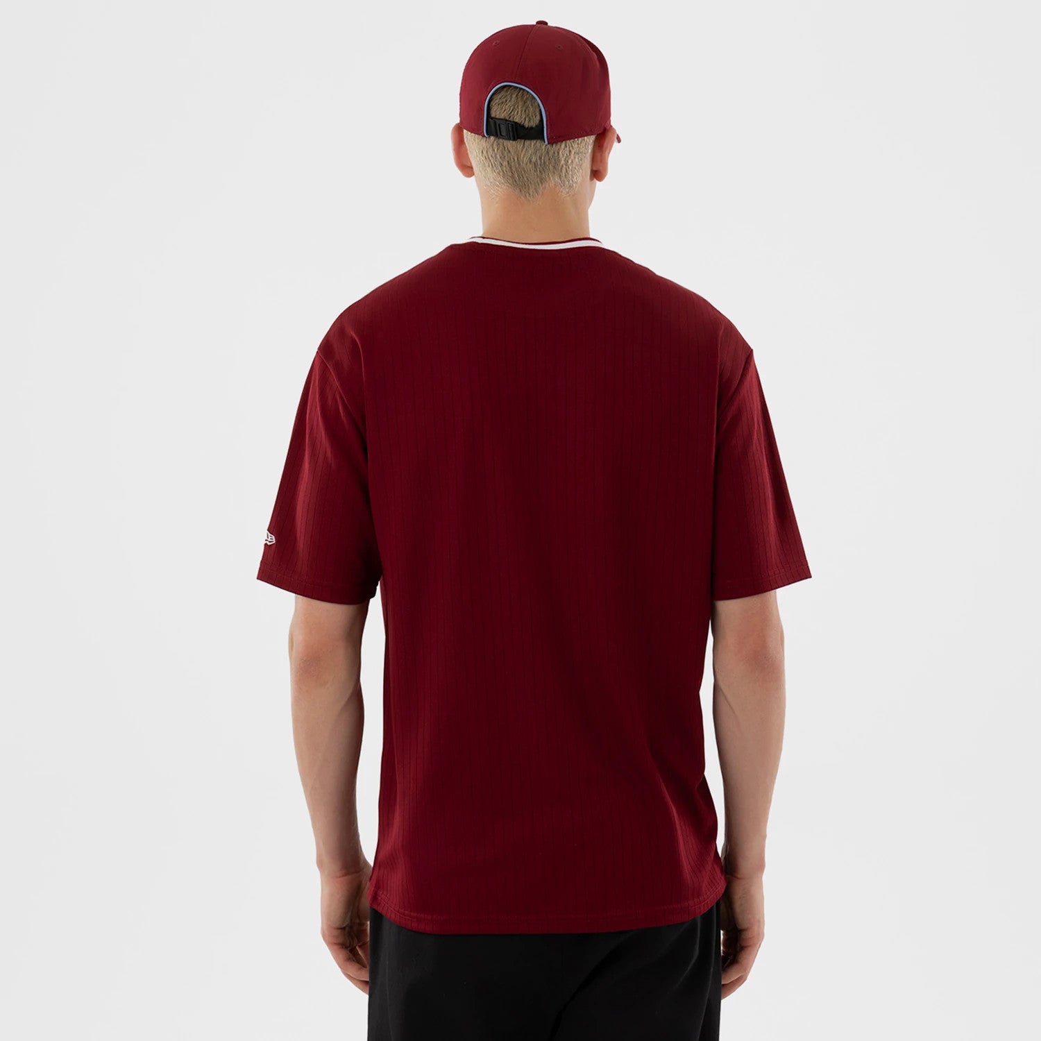 The model is wearing this MLB Philadelphia Phillies Oversized T-Shirt in dark red. 2
