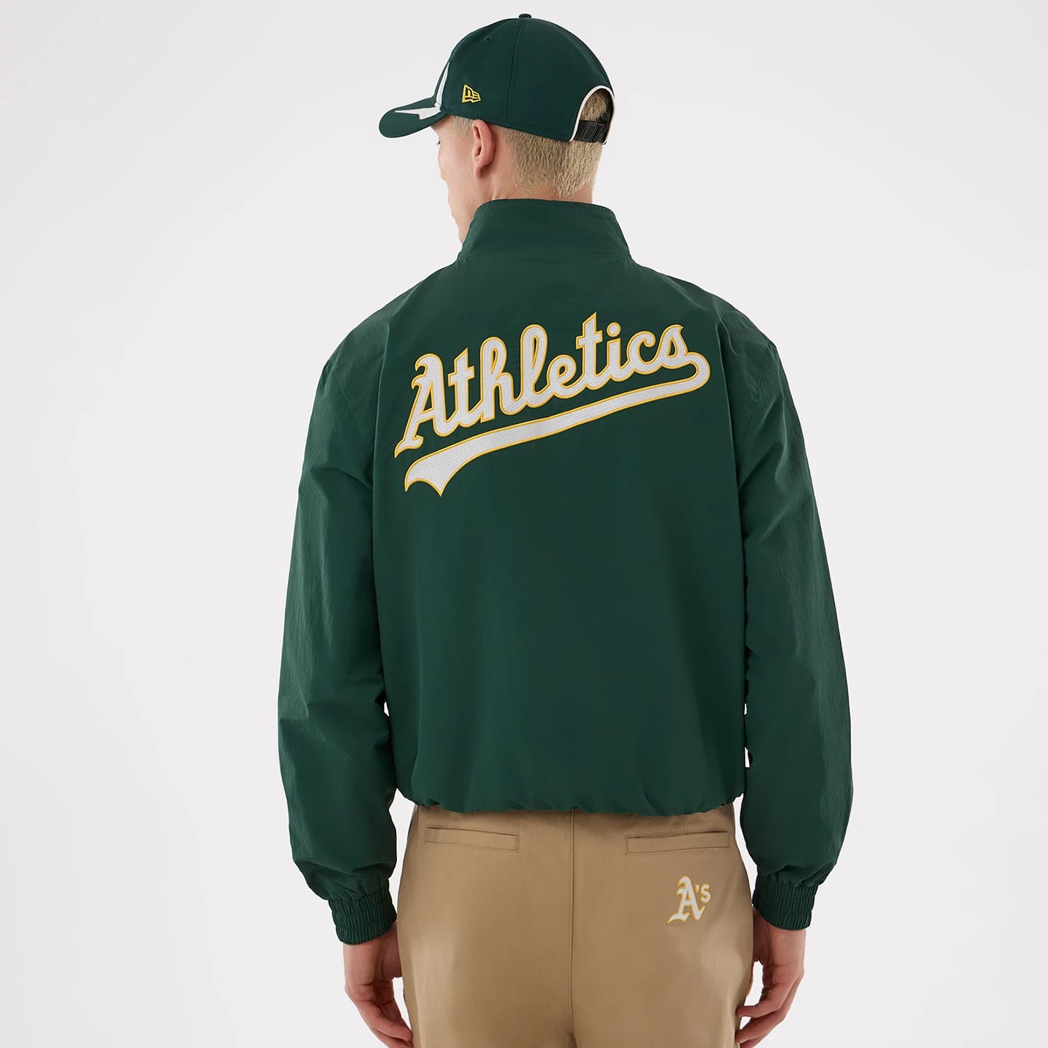 The model is wearing this MLB Athletics Sports Jacket in dark green. 2