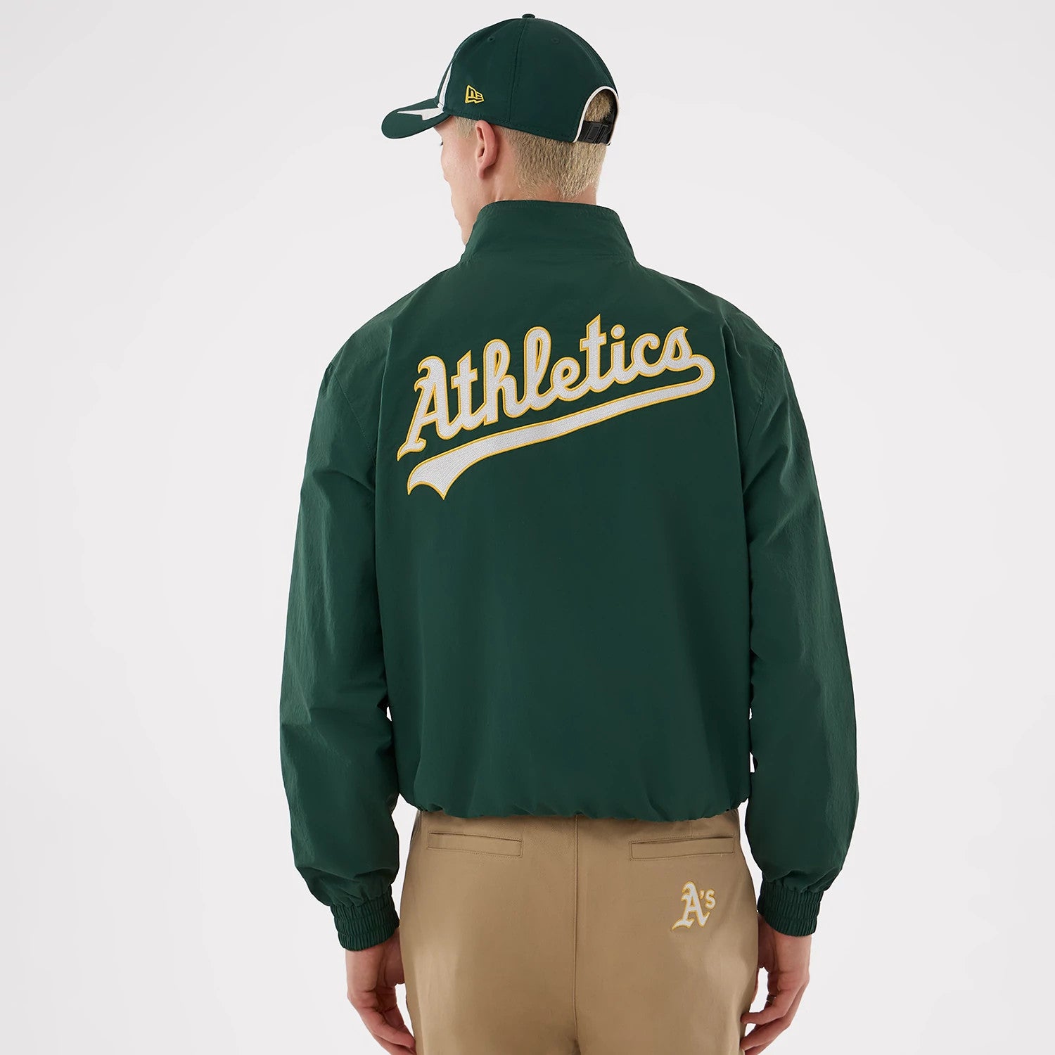 The model is wearing this MLB Athletics Sports Jacket in dark green. 2