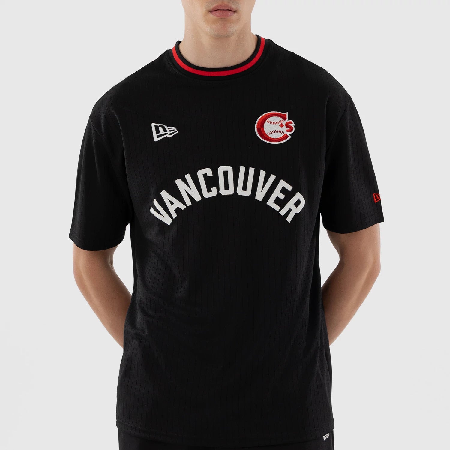 The model is wearing this MiLB Vancouver Canadians Oversized T-Shirt in black. 3