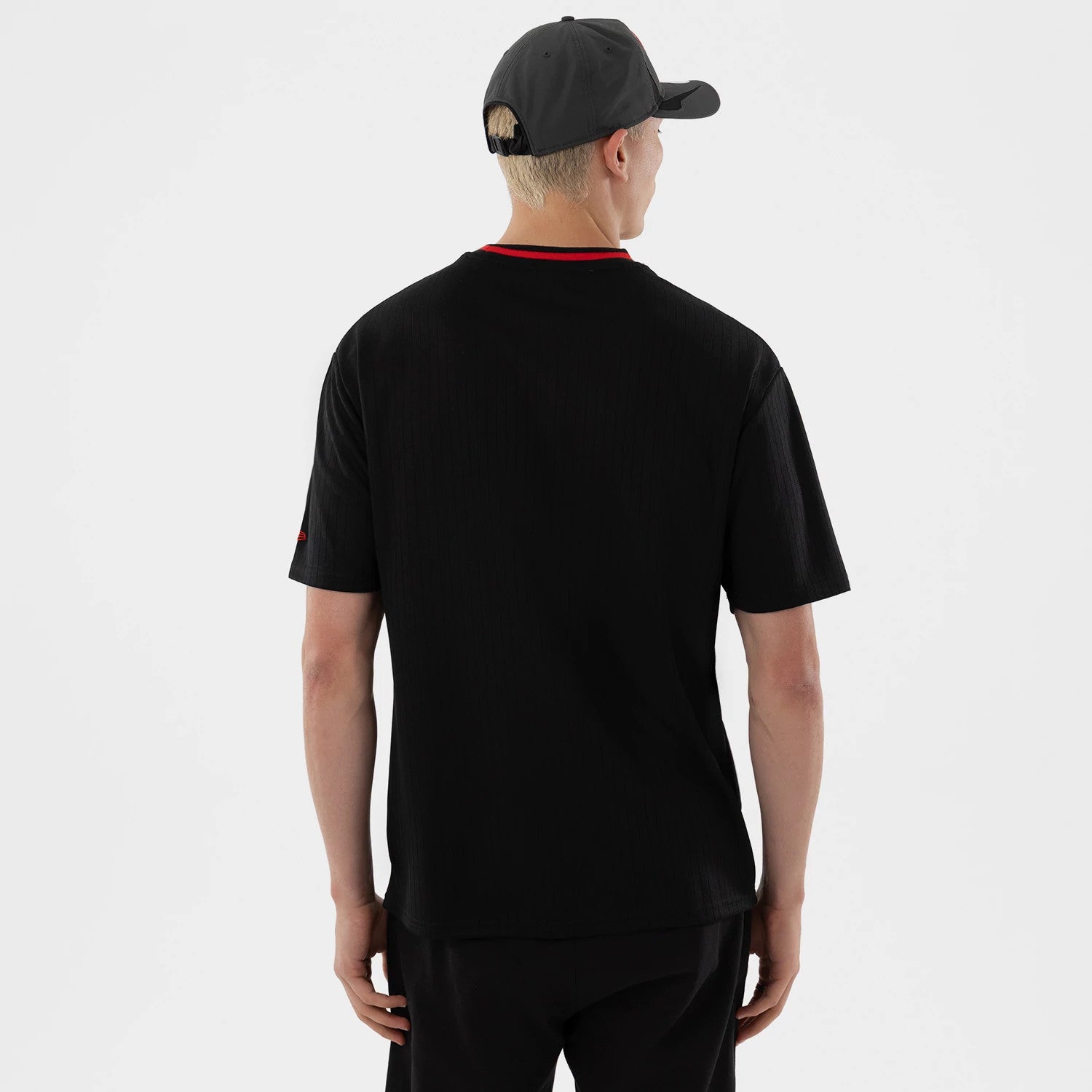 The model is wearing this MiLB Vancouver Canadians Oversized T-Shirt in black. 2
