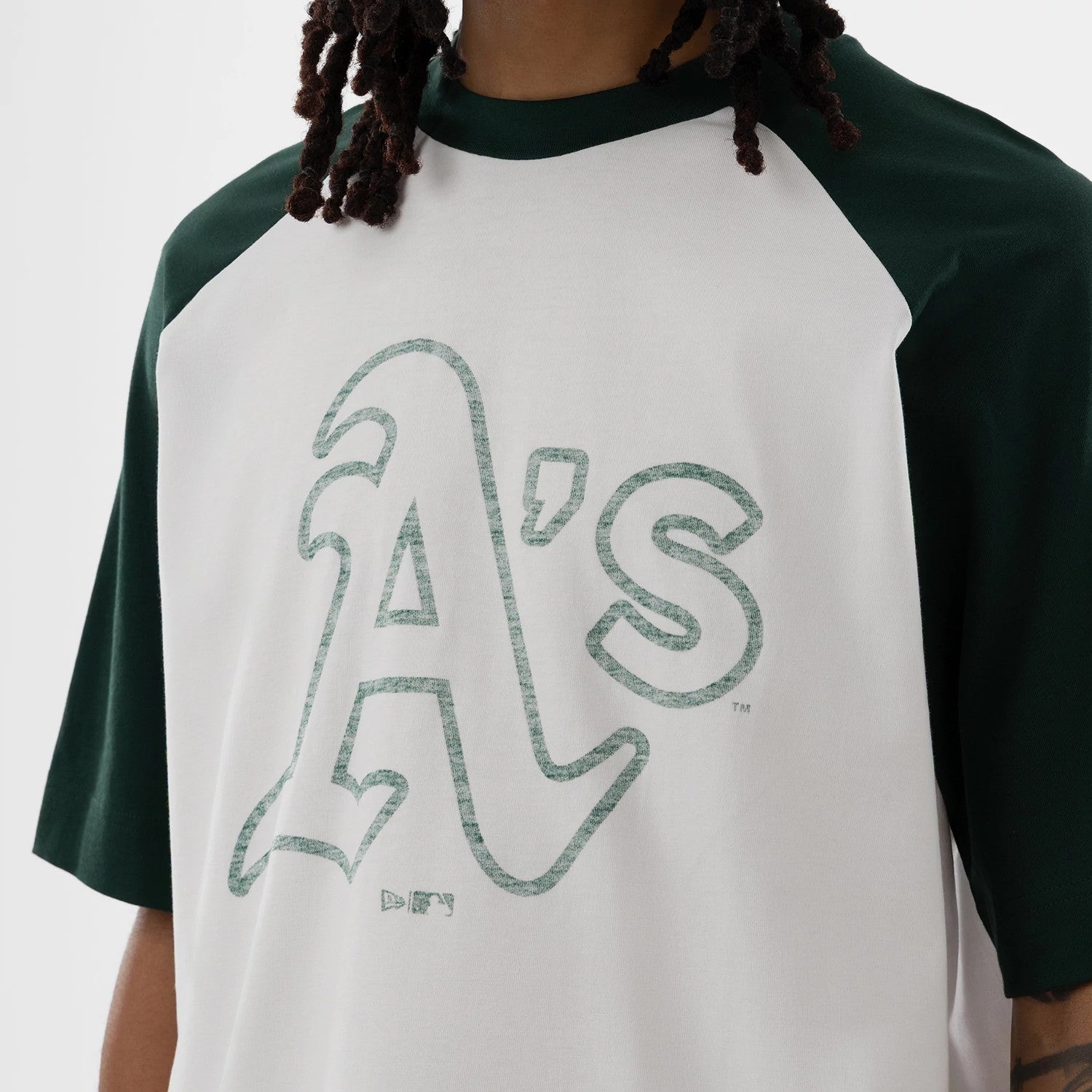 The model is wearing this MLB Athletics Boxy T-Shirt in white. 3