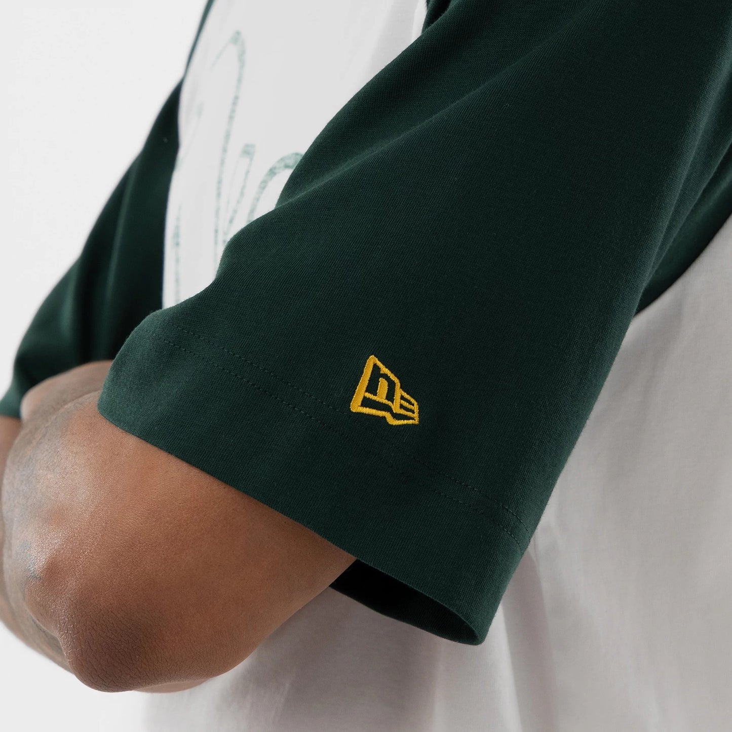 The model is wearing this MLB Athletics Boxy T-Shirt in white. 7