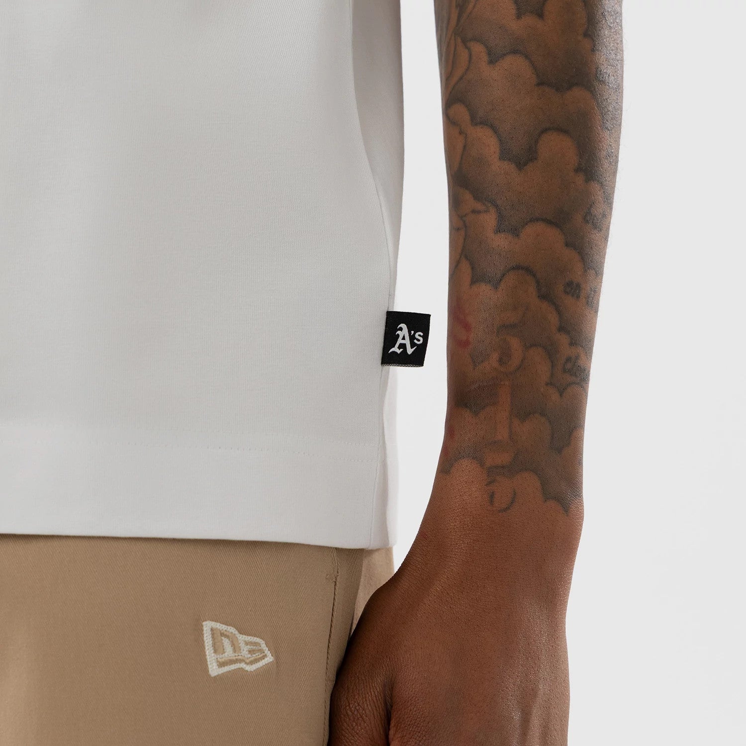 The model is wearing this MLB Athletics Boxy T-Shirt in white. 4