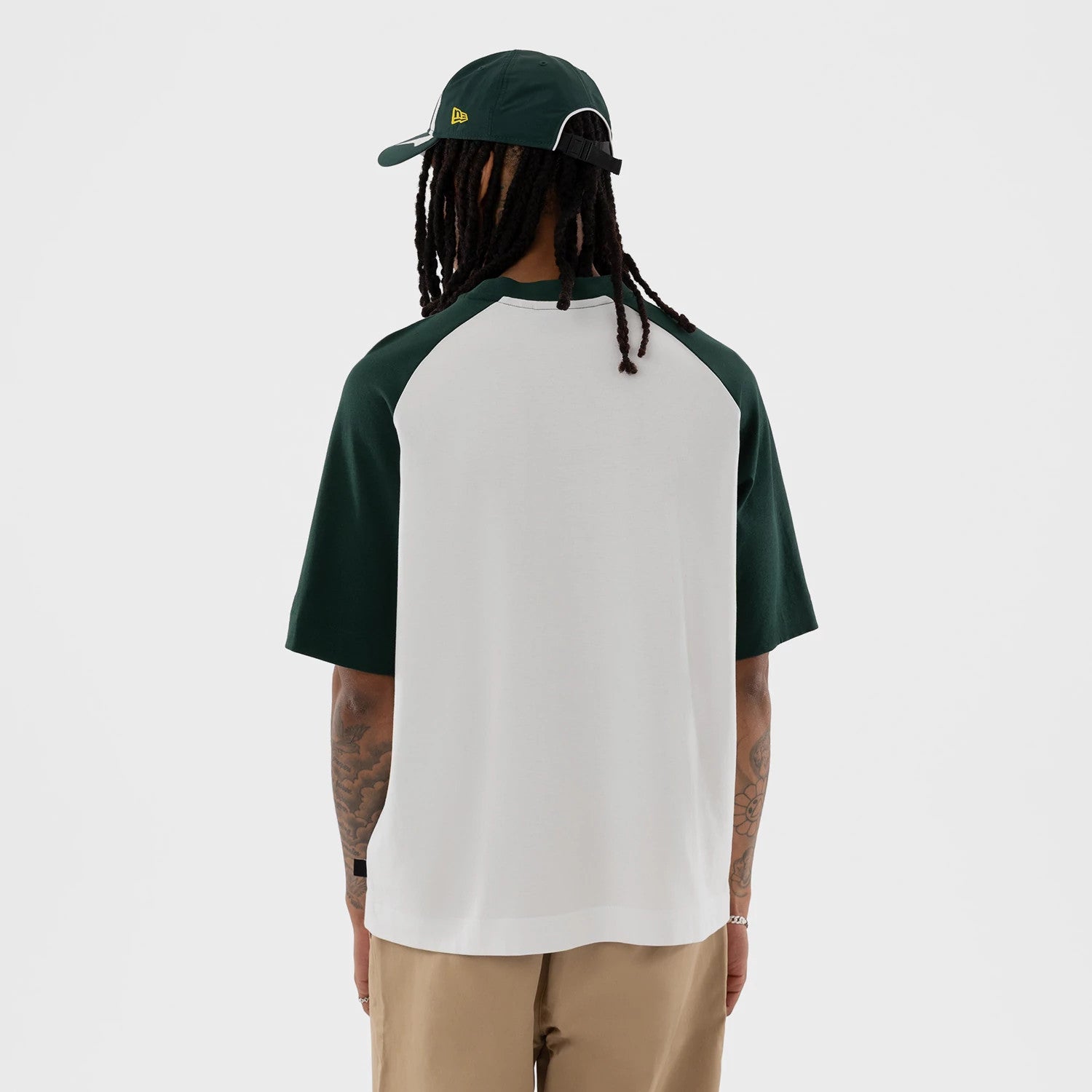 The model is wearing this MLB Athletics Boxy T-Shirt in white. 2