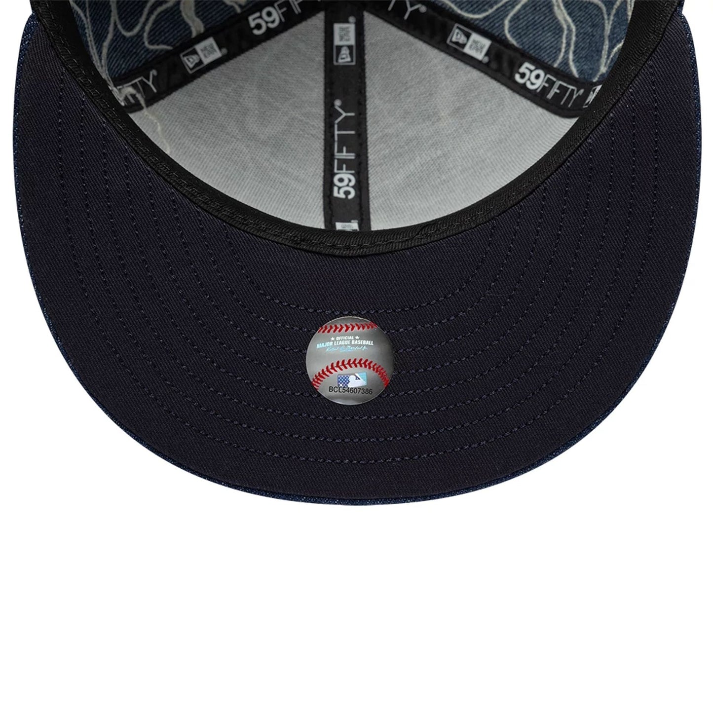 Pictured is this MLB Floral Denim New York Yankees 59FIFTY Fitted cap in blue. 7