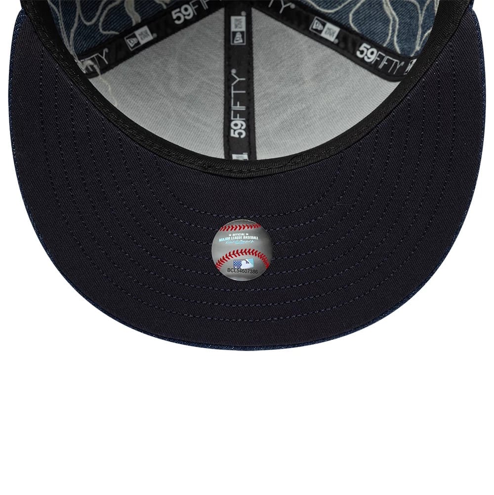 Pictured is this MLB Floral Denim New York Yankees 59FIFTY Fitted cap in blue. 7