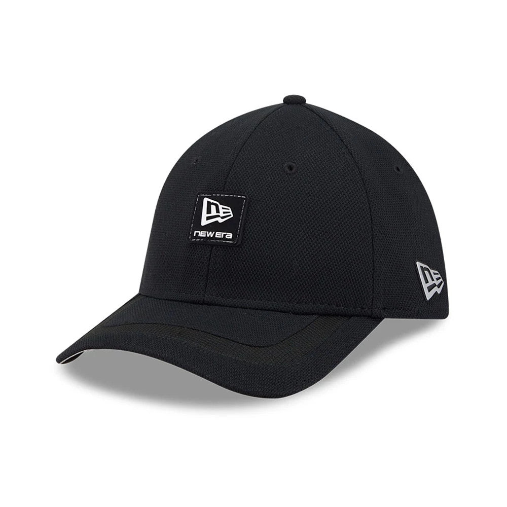 Pictured is this New Era Golf Rubber Patch 39THIRTY M-Crown Stretch Fit cap in black. 1