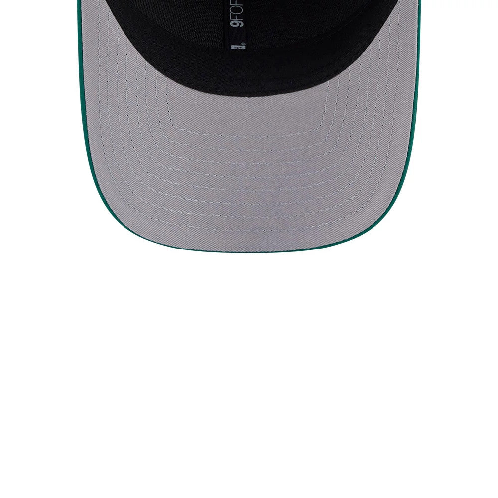 Pictured is this New Era Golf 9FORTY M-Crown cap in green. 2