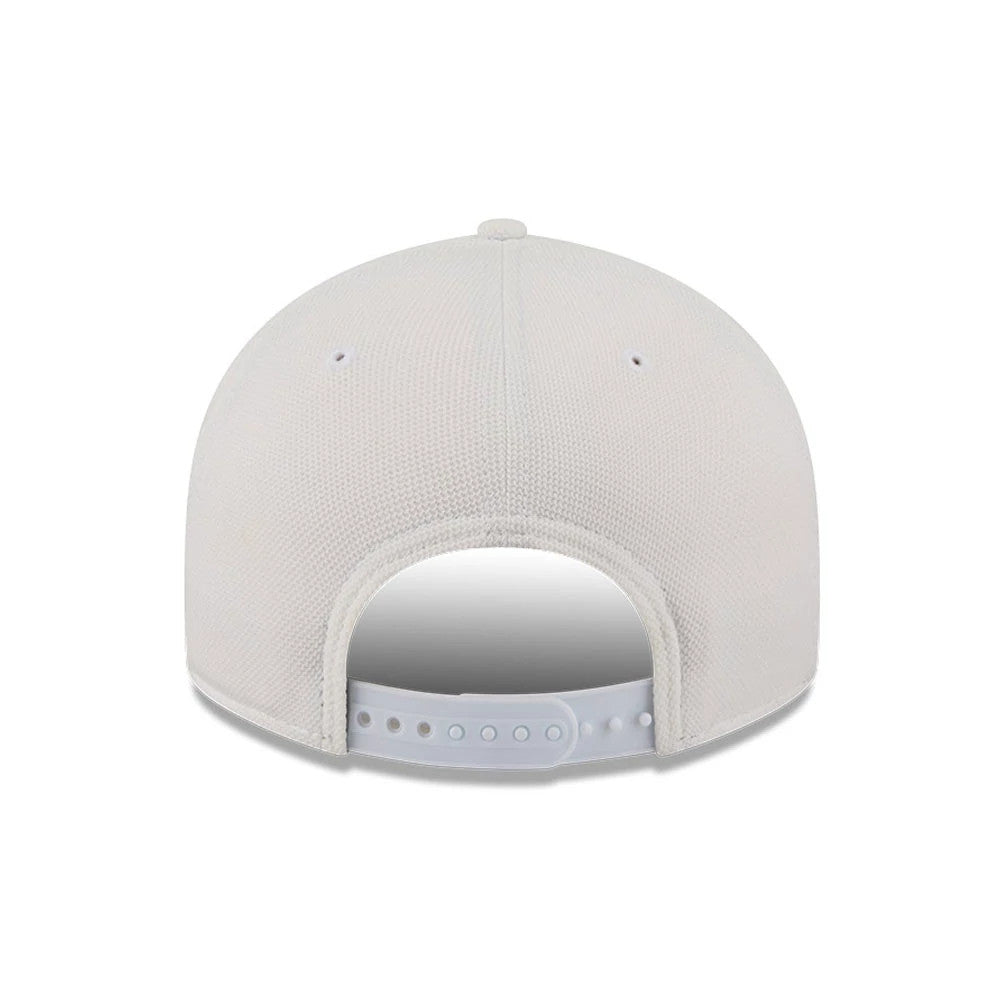 Pictured is this New Era Golf 9FIFTY Snapback cap in white. 7